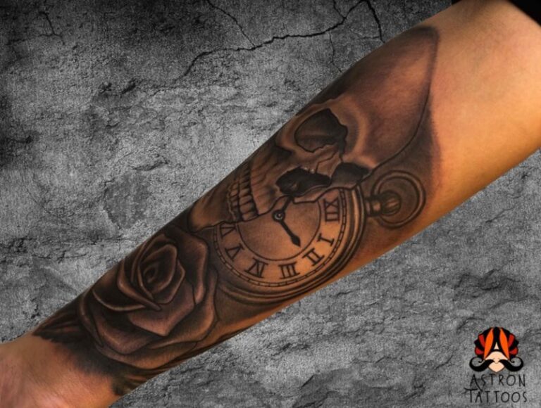 Black and Grey Skull, Rose, and Clock Tattoo: Timeless Art at Astron Tattoos Bangalore