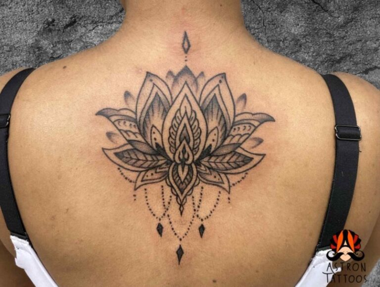 Ornamental Lotus Tattoo on Upper Back: Elegance and Spirituality in Ink by Astron Tattoos Bangalore